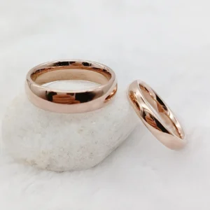 Subtle rose gold his and hers tungsten wedding bands, 6mm and 4mm domed pair
